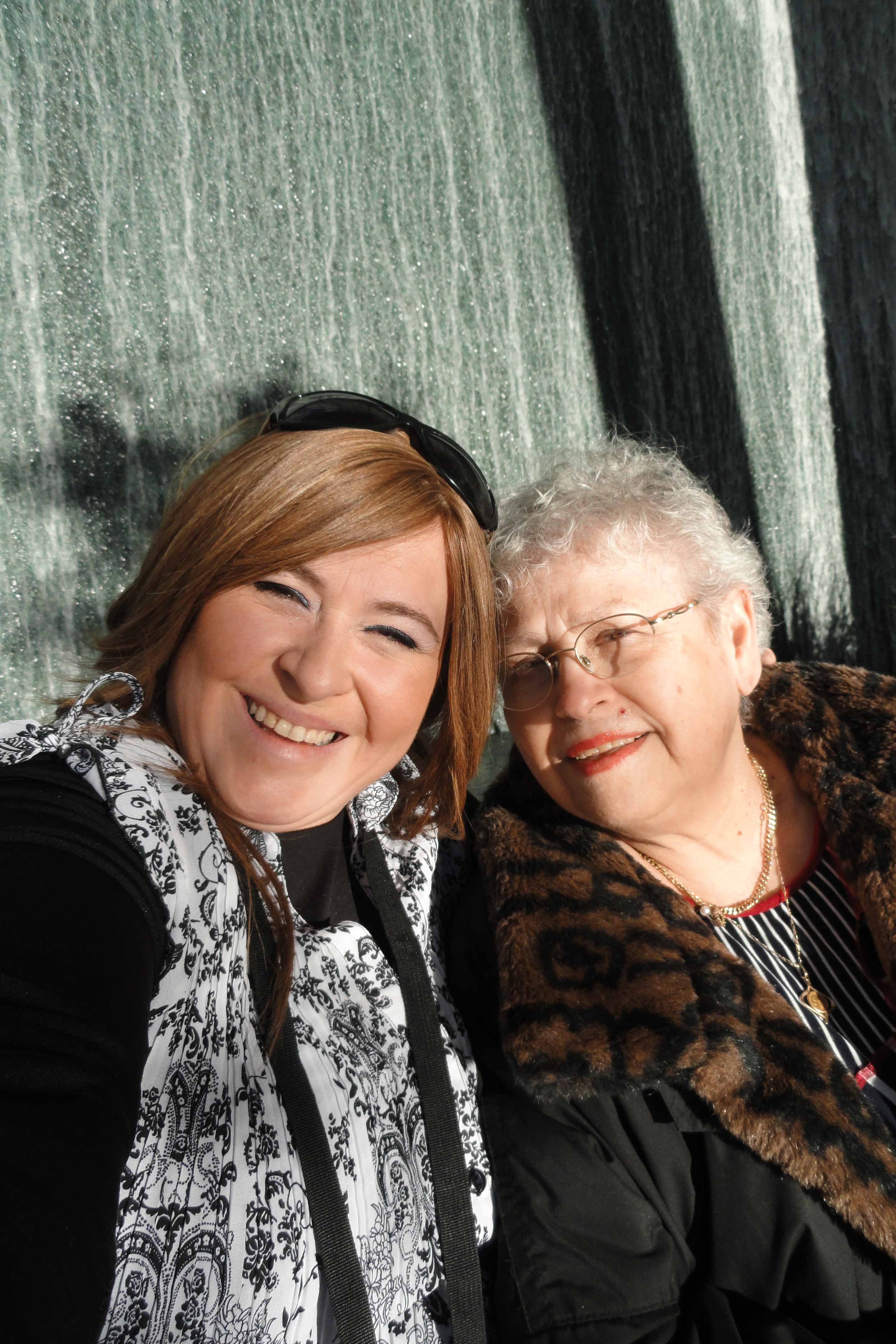 mom and daughter smiling